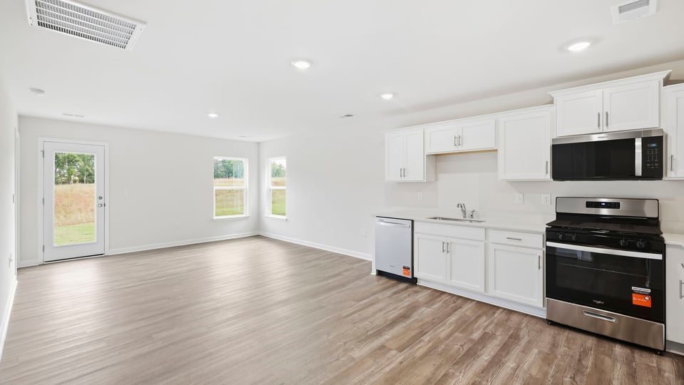 Kitchen with stainless steel appliances.