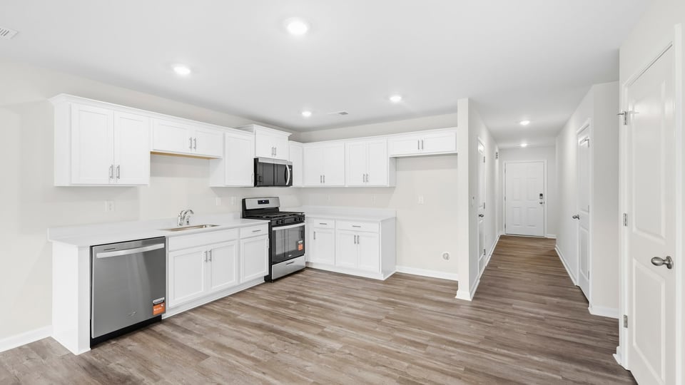 Kitchen with stainless steel appliances.