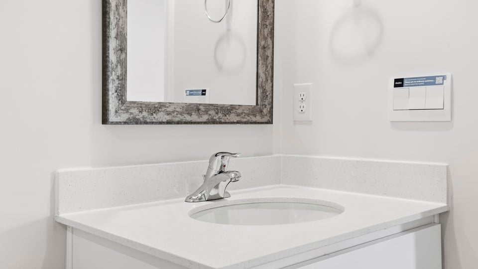 Bathroom with single vanity sink.