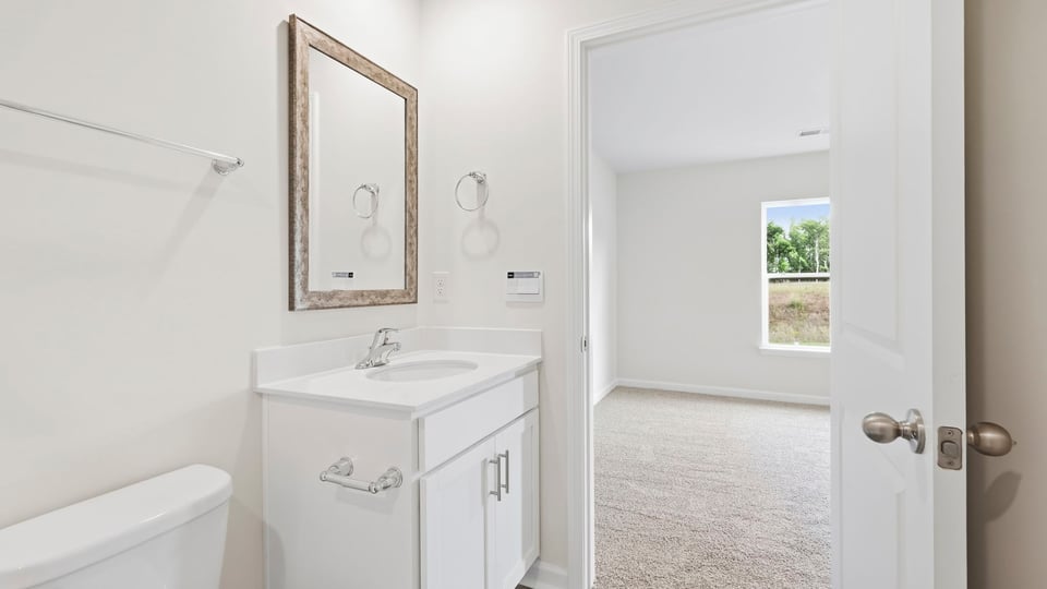 Bathroom with single vanity sink.