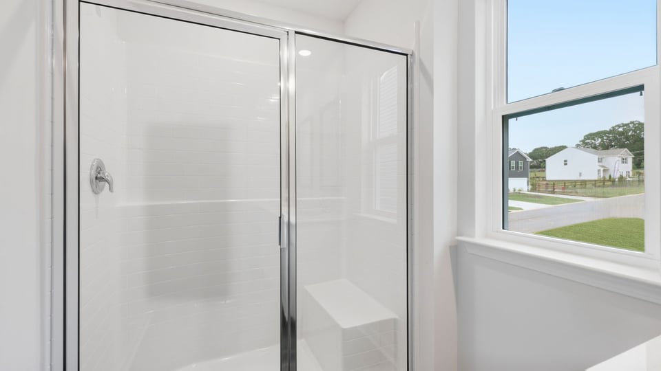 Bathroom with walk in shower.