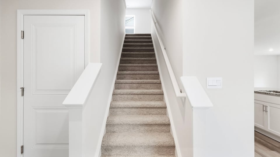 View of stairs to bedrooms.