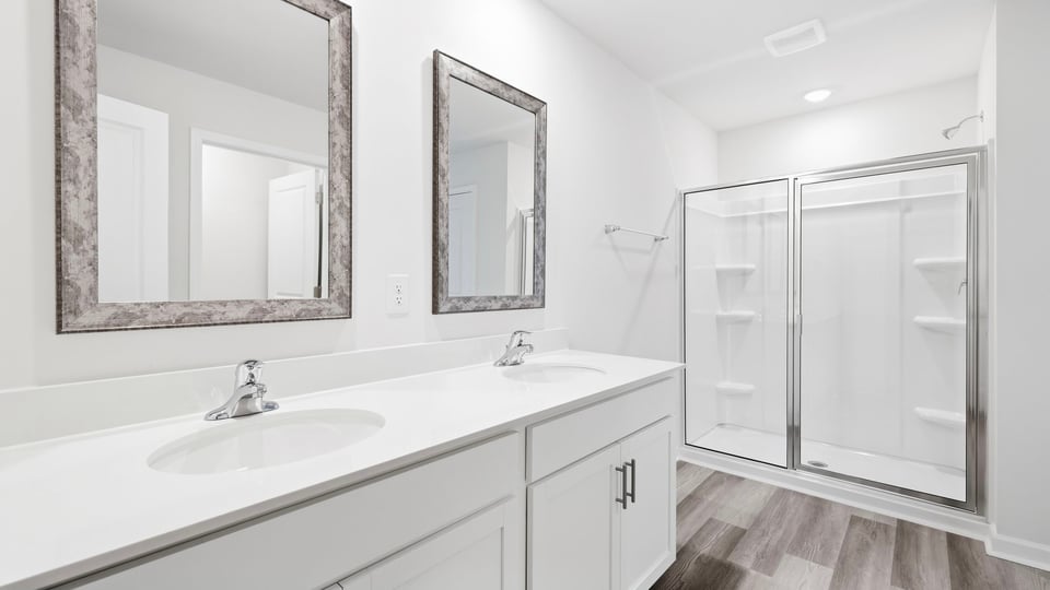 Bathroom with walk in shower.