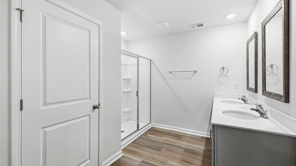 View of bathroom and shower.