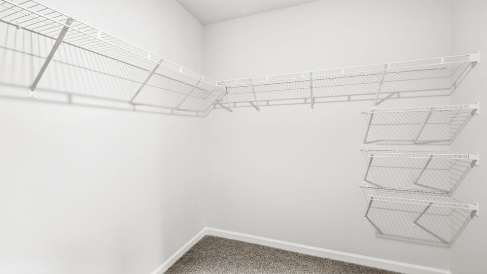 Closet with hanging storage racks.