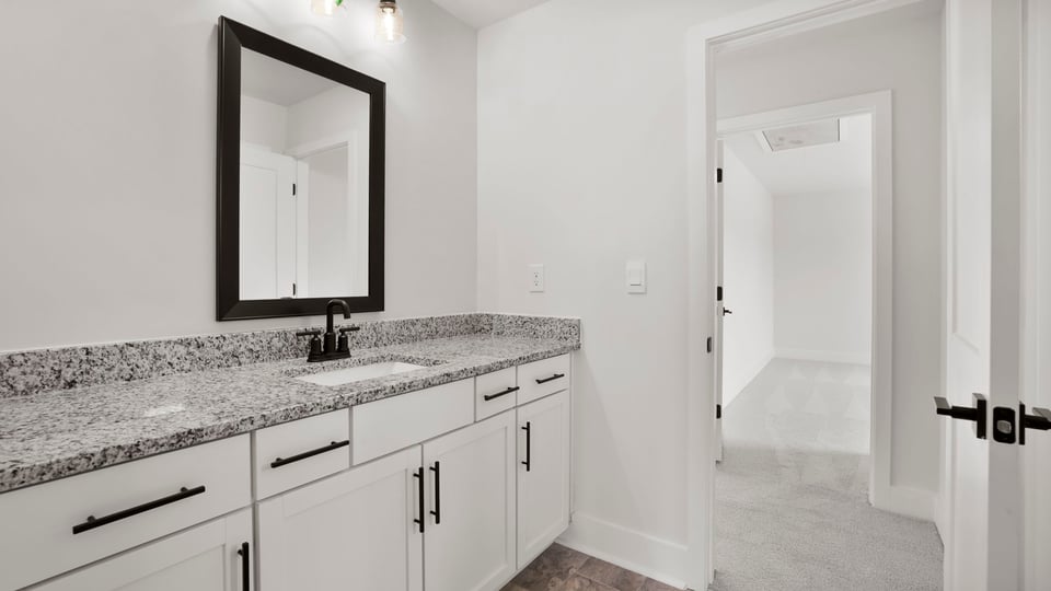 Bathroom with double vanity sink.