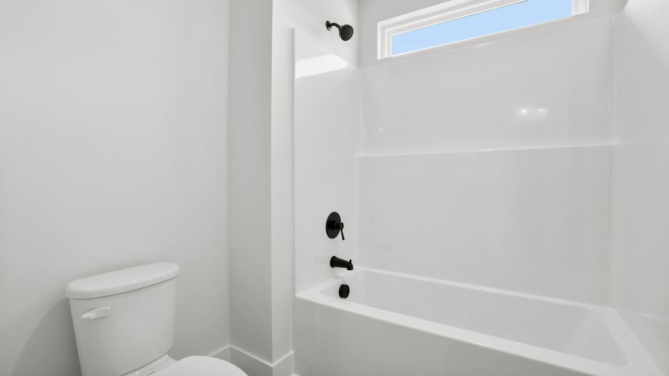 Bathroom with bathtub.