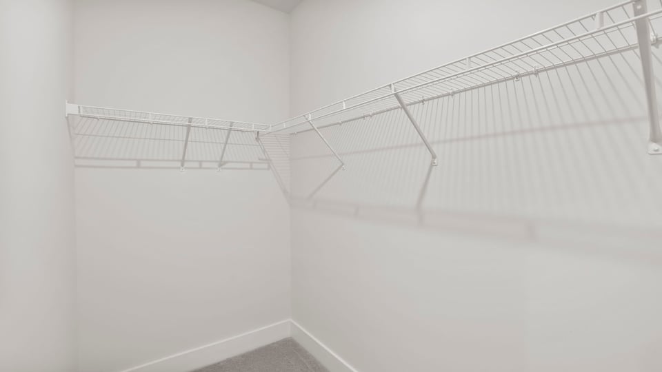 Closet with hanging storage racks.