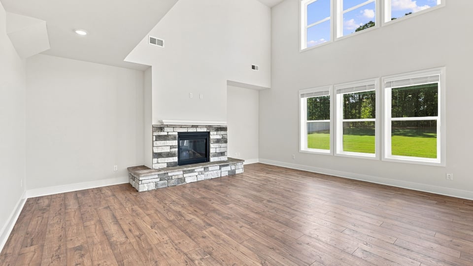 Living room with view of kitchen.