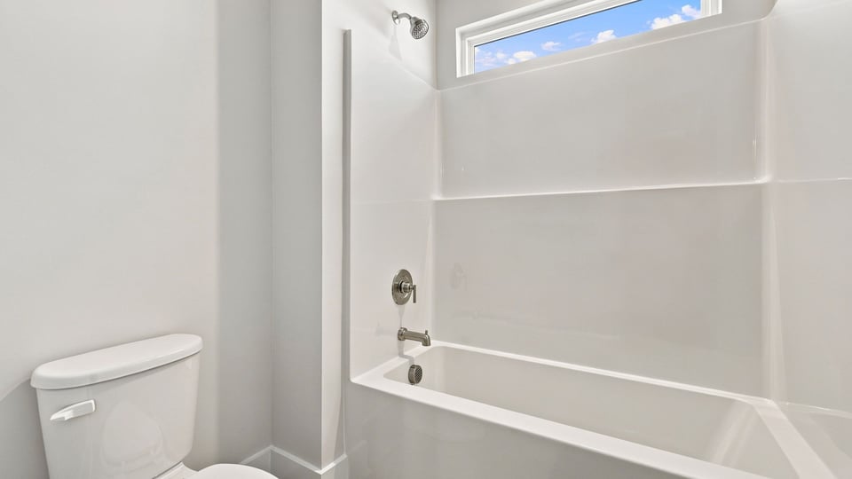 Bathroom with bathtub.