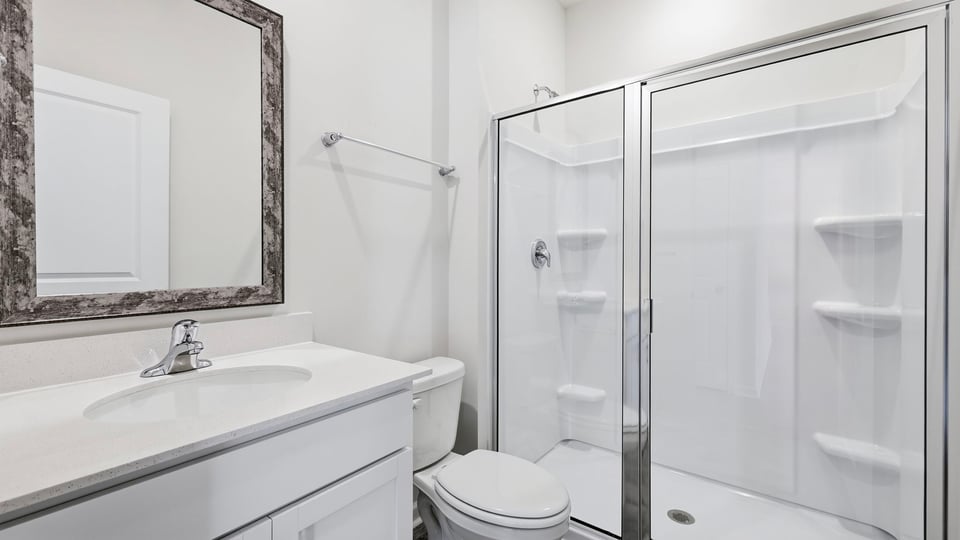 Bathroom with single vanity sink and shower.