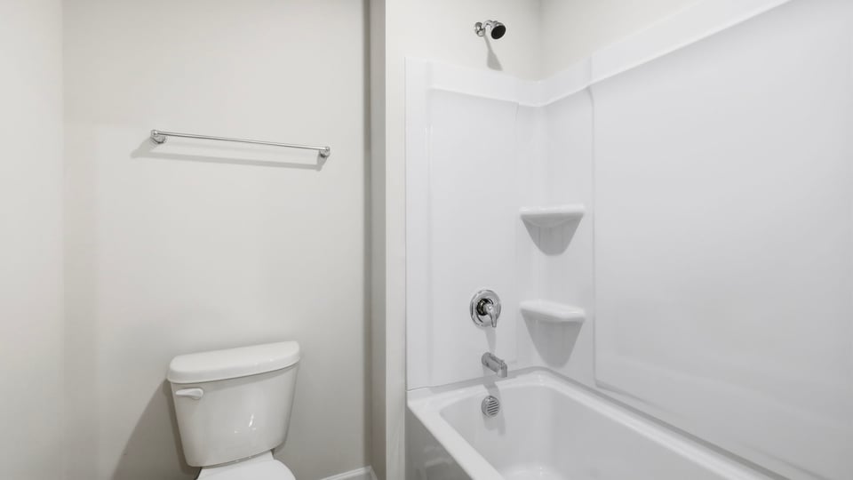 Bathroom with bathtub.