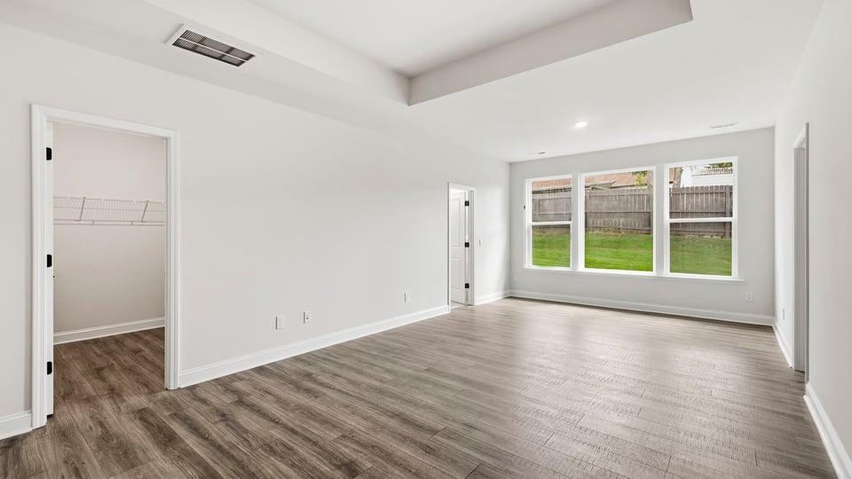 Bedroom with windows.