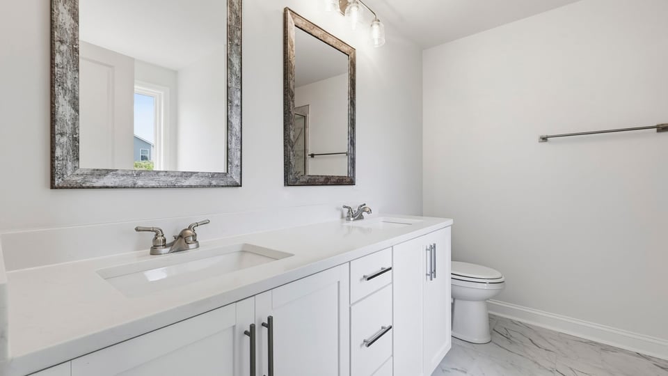 Bathroom with double vanity sink.