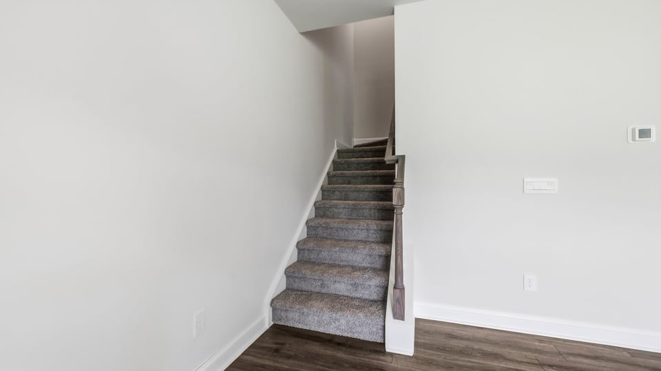 Stairs to bedrooms.