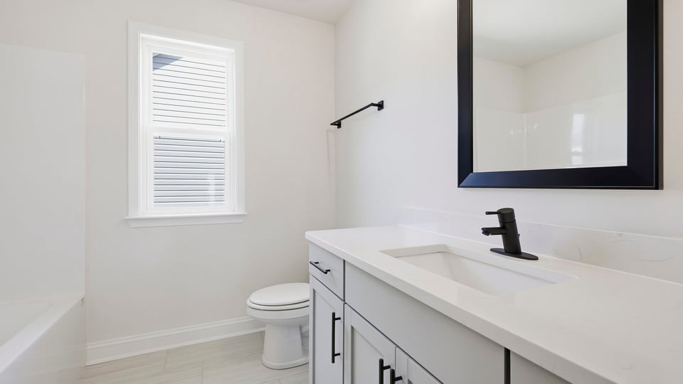 Bathroom with double vanity sink.