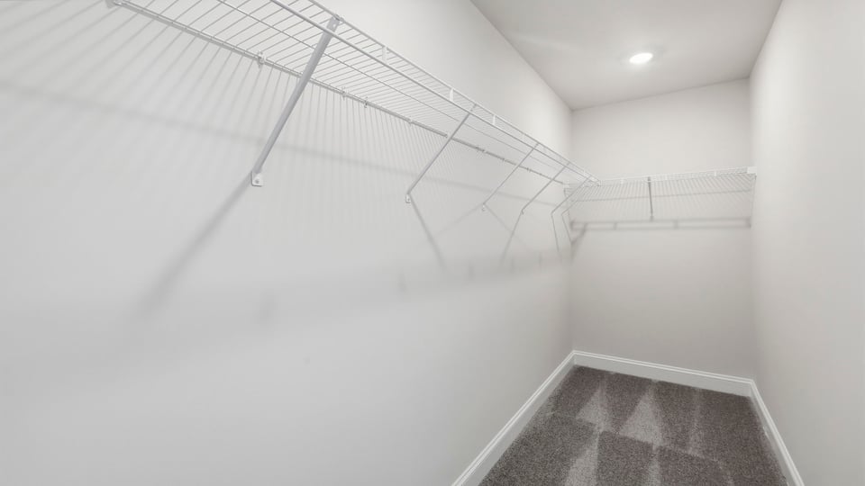 Closet with hanging storage closet.