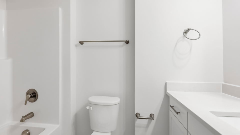Bathroom with sink and bathtub.