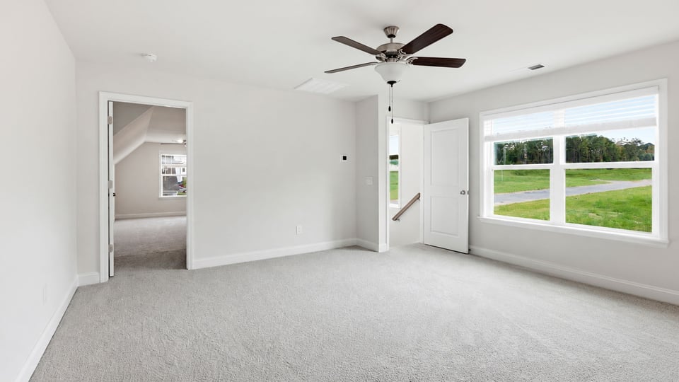 Stairs to additional bedrooms.