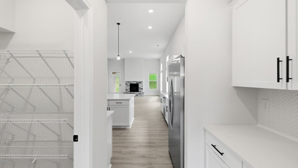 Butler's pantry with quartz countertops.