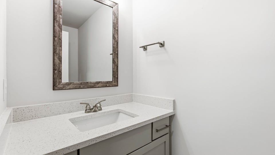 Bathroom with single vanity sink.