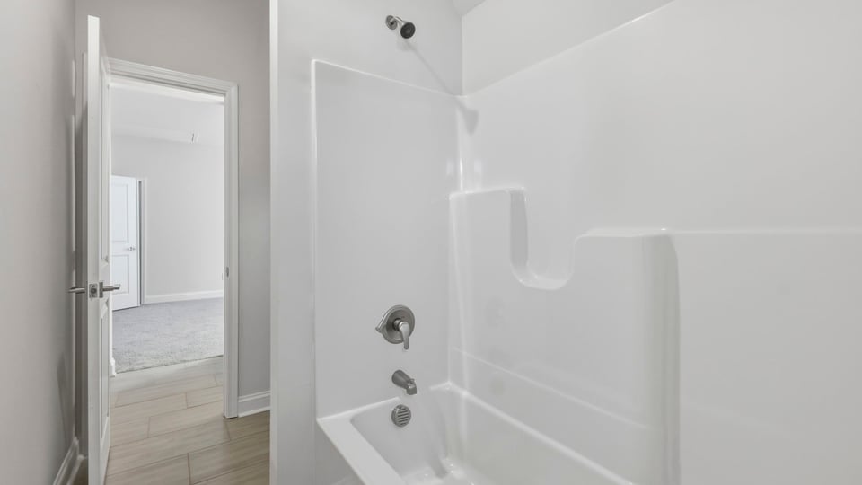 Bathroom with bathtub.