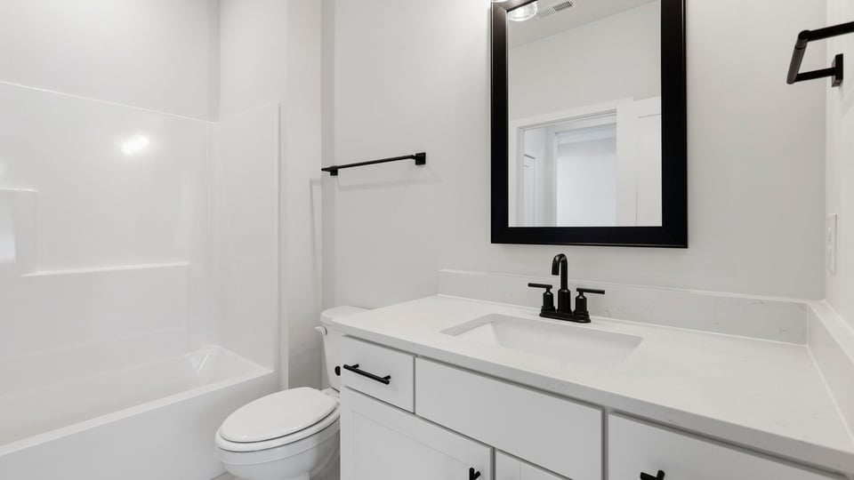 Bathroom with single vanity sink.