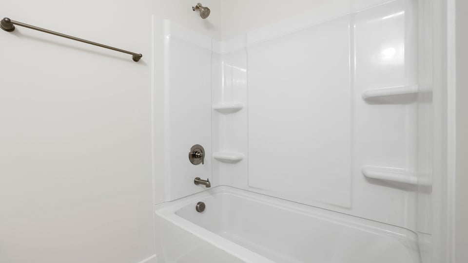 Bathroom with bathtub.