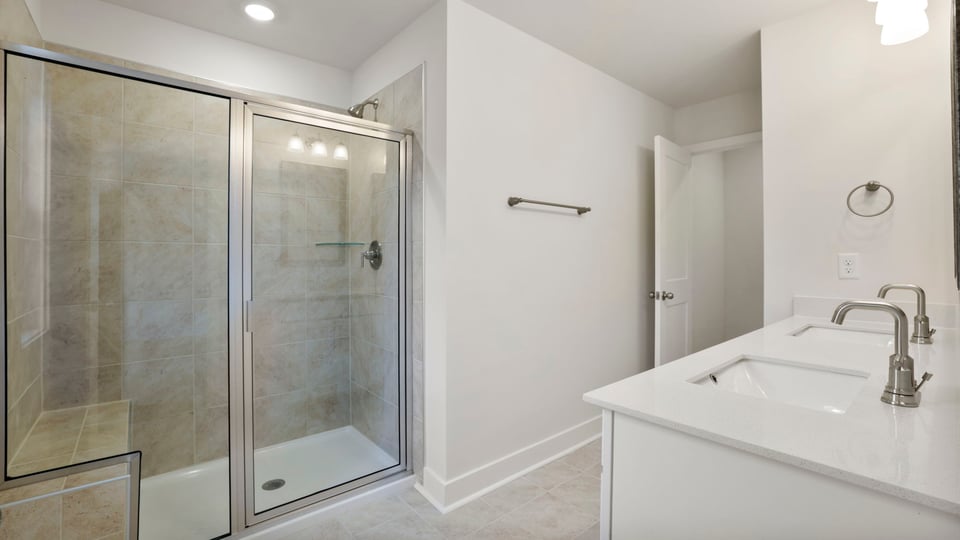 Bathroom with walk in shower.