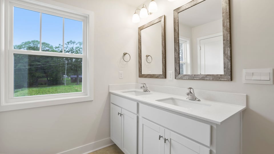 Bathroom with double vanity sink.