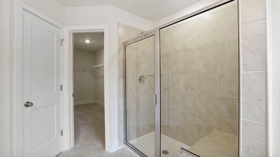 Bathroom with walk in shower.