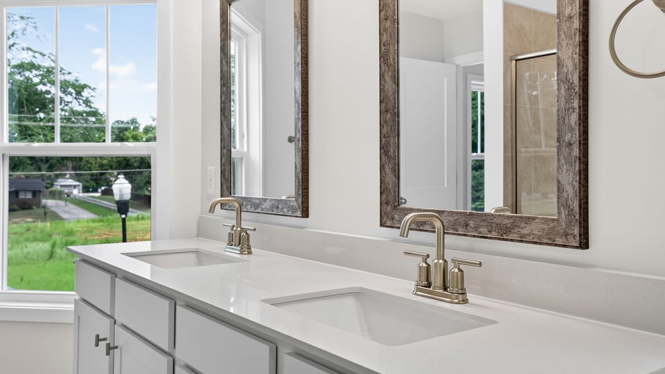 Bathroom with walk in shower.