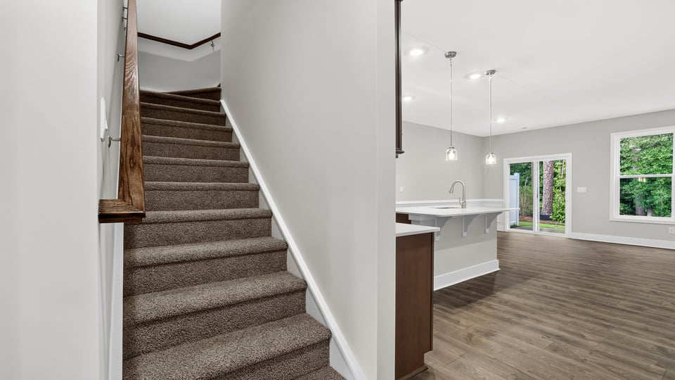 Stairs to bedrooms.