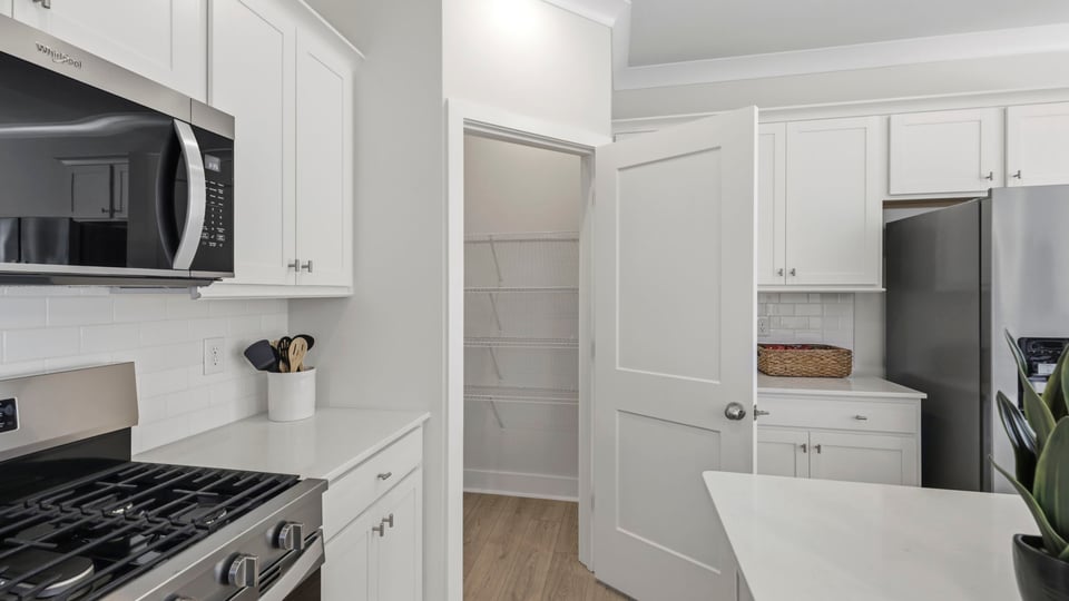 Kitchen with large island and countertops.