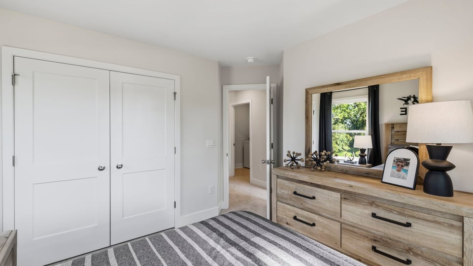 Bedroom with large windows.