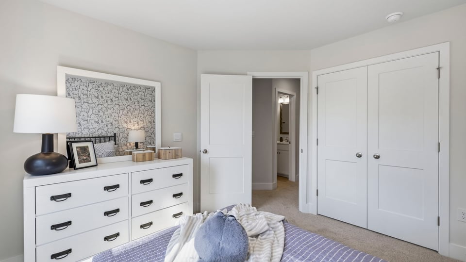 Bedroom with large windows.