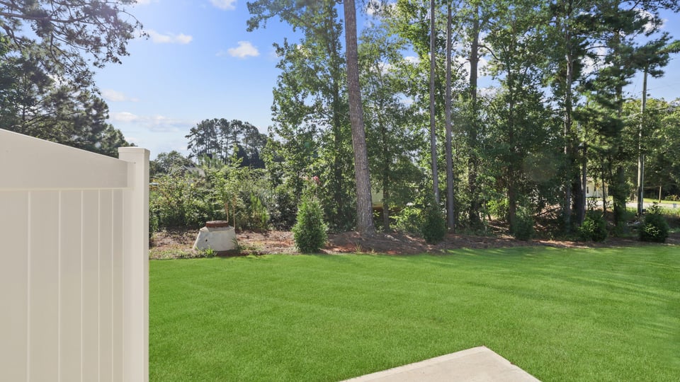 Large backyard of home.