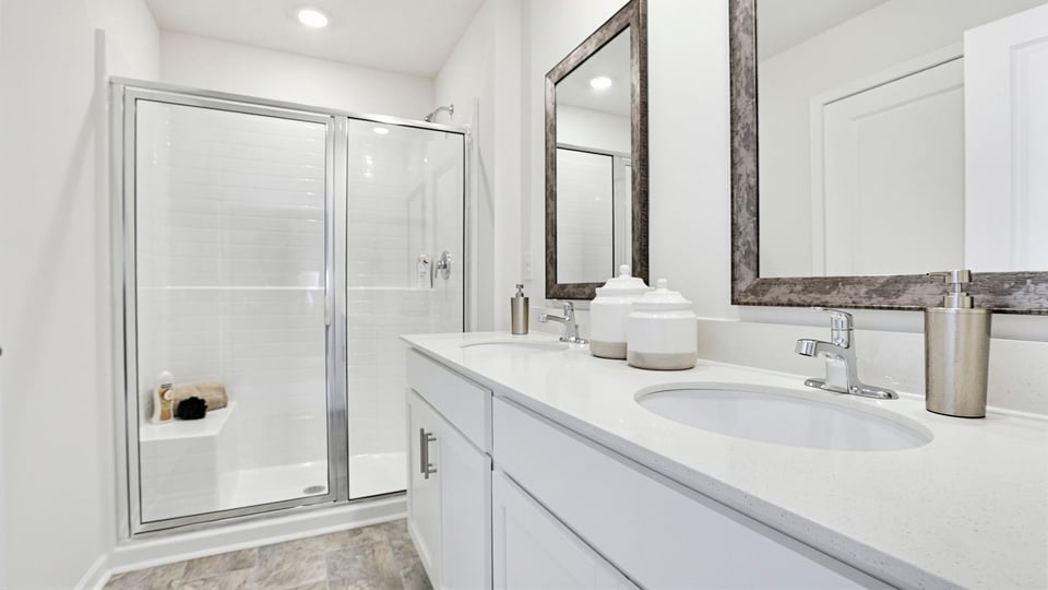 Bathroom with double vanity sinks.