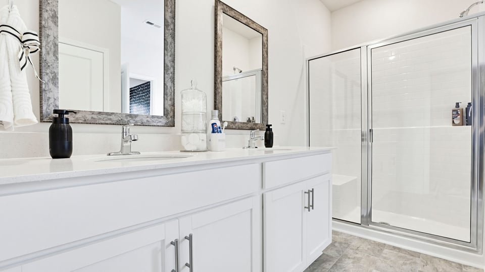 Bathroom with double vanity sinks.