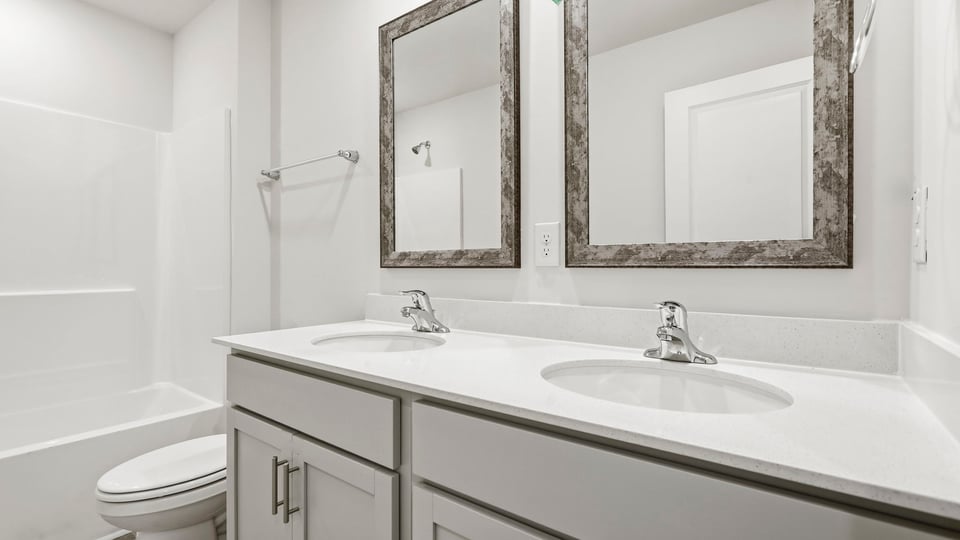 Bathroom with double vanity sink.