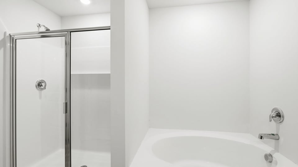 Bathroom with walk in shower.