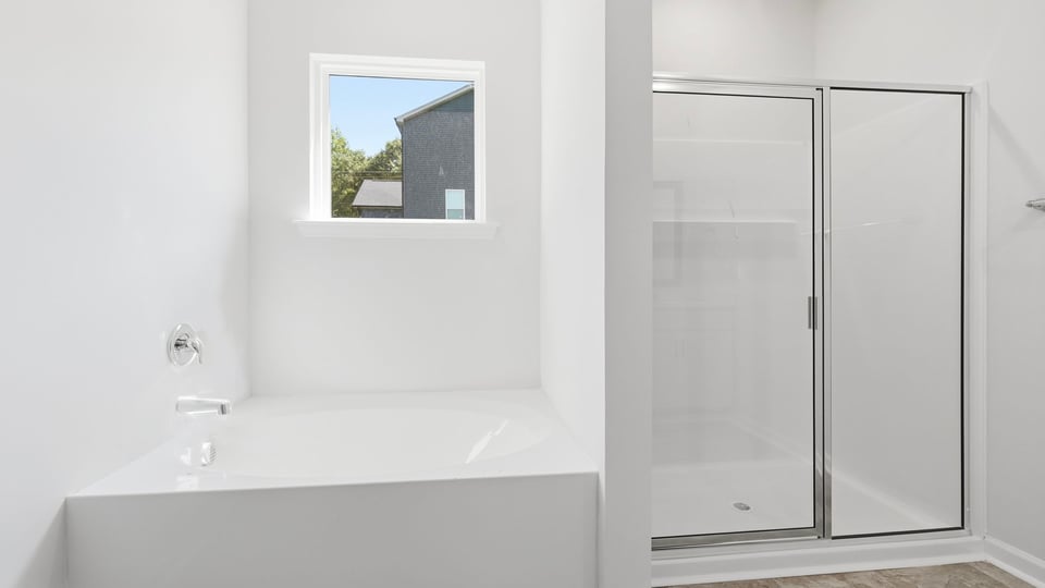 Bathroom with walk in shoer.