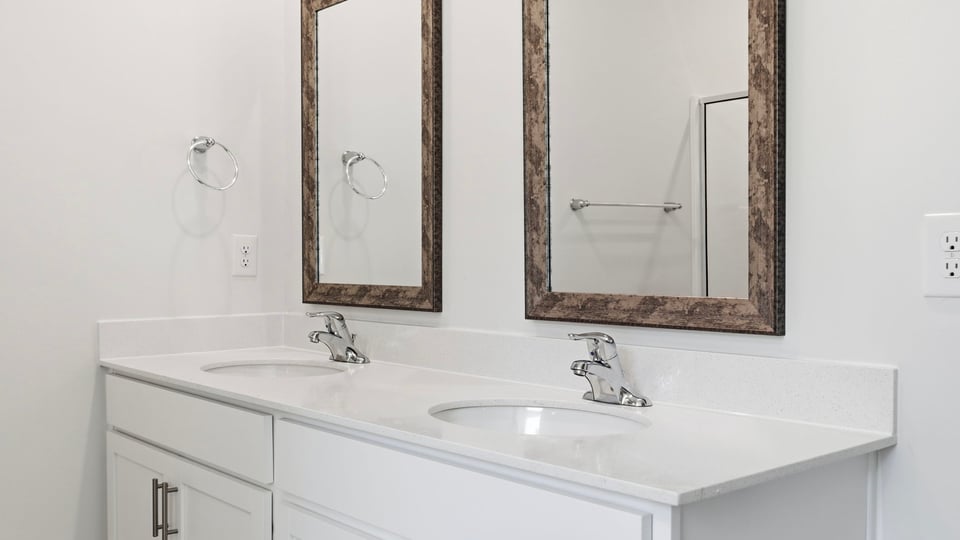 Bathroom with double vanity sink.