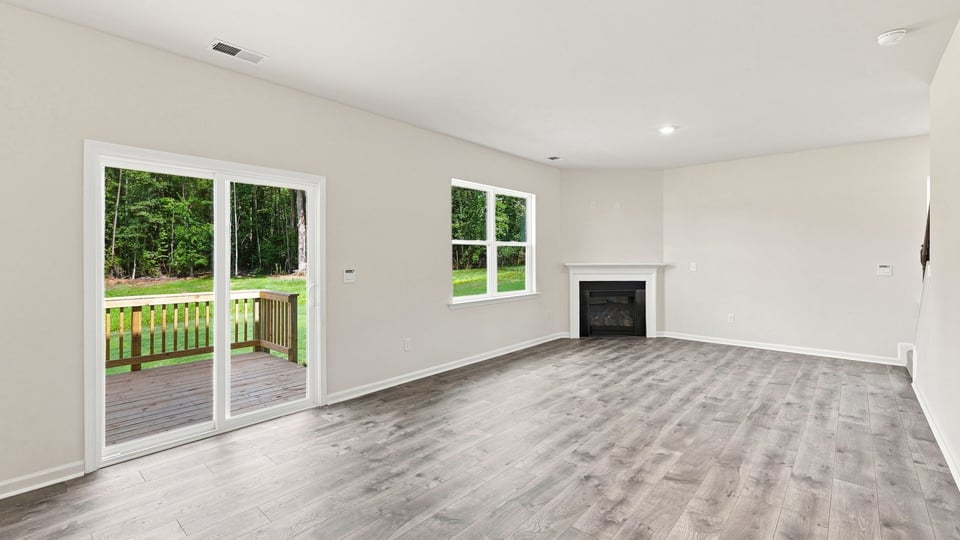 Living room with windows and fireplace,
