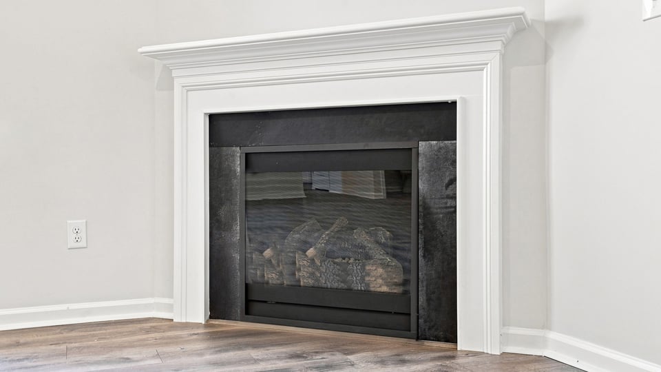 Living room with windows and fireplace,