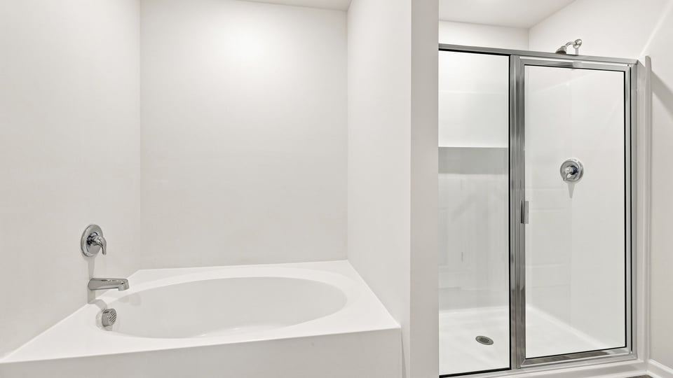 Primary bathroom with double vanity sinks.