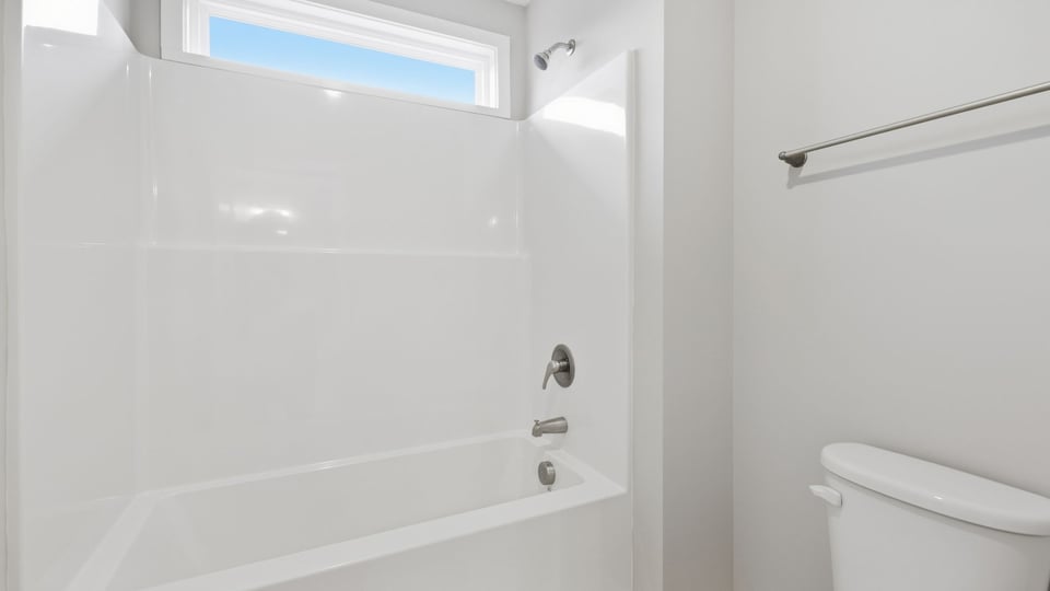 Bathroom with bathtub.