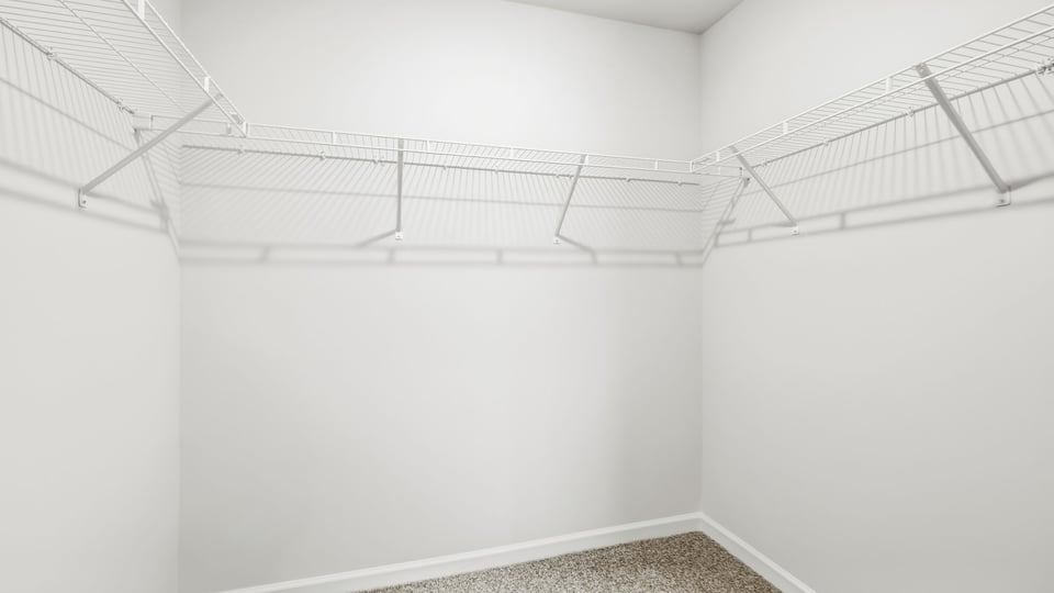 Closet with hanging storage racks.