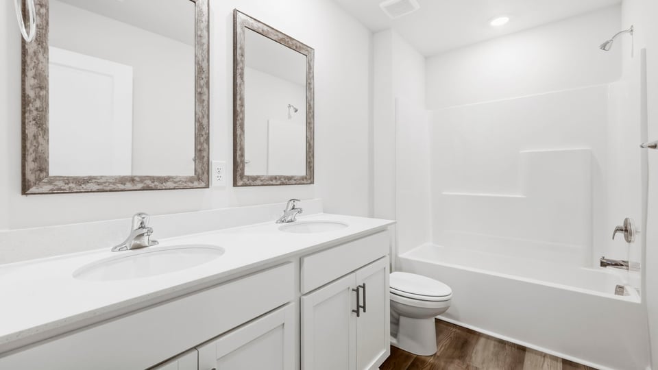 Bathroom with double vanity sink.