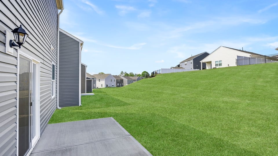 Large backyard of home.